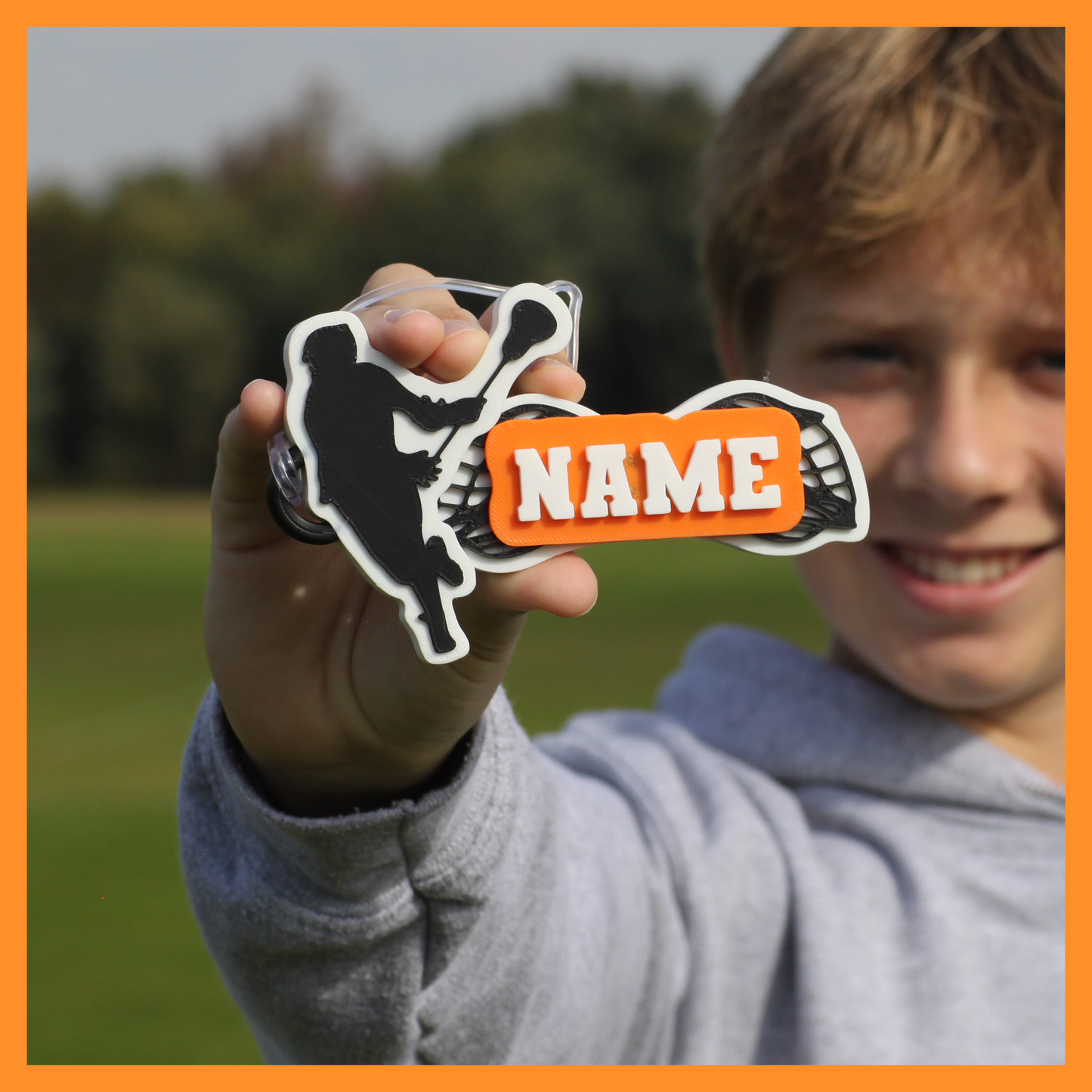 Lacrosse Bag Tag (Person & Helmets)